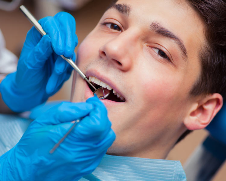 man having dental check up